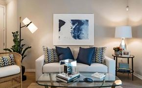 Fullerton apartment for rent - Well-Appointed Living Room with Glass Coffee Table and Soft Lighting