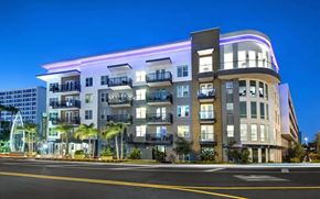 Tampa apartment for rent - Anchor Riverwalk Apartment Exterior with Balconies and Modern Lighting