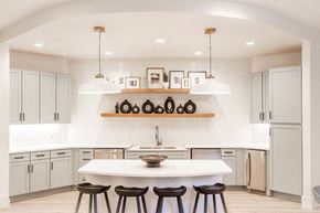 Raleigh apartment for rent - Open Kitchen with Custom Cabinetry, Floating Shelves, and Modern Finishes