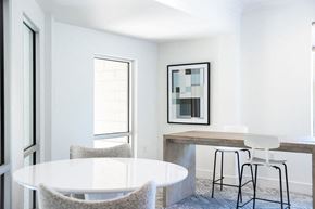 Raleigh apartment for rent - Shared Work Area Featuring Bar Seating and Round Meeting Table