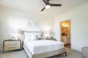 Raleigh apartment for rent - Primary Bedroom with Neutral Tones and Attached Ensuite Bathroom