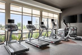 Arvada apartment for rent - Gateway Arvada Ridge Fitness Studio with Cardio Machines and Expansive Windows