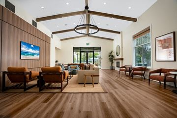 Rancho Cucamonga apartment for rent - a large living room with furniture and a chandelier