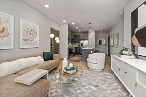 Raleigh apartment for rent - a living room with a couch and a table