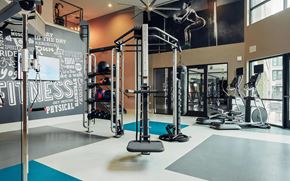Frisco apartment for rent - Open Gym Space with Cable Trainer, Punching Bag, and Cardio Machines