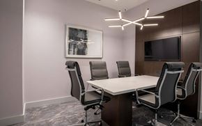 Atlanta apartment for rent - Conference Room with TV, Modern Lighting, and Executive Chairs