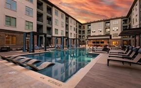 Fort Worth apartment for rent - The Elm at River Park Pool Illuminated at Dusk