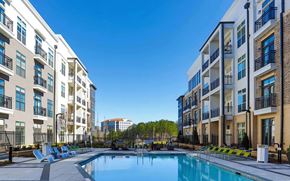 Alpharetta apartment for rent - Courtyard Swimming Pool Area with Seating and Landscaping