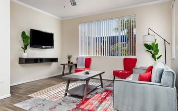 Phoenix apartment for rent - a living room with a couch and a coffee table and a television