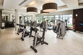 Atlanta apartment for rent - Spacious Gym with Cardio Machines and Floor-to-Ceiling Windows