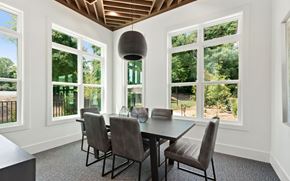 Charlotte apartment for rent - Community Workspace with Large Collaborative Table and Scenic Views