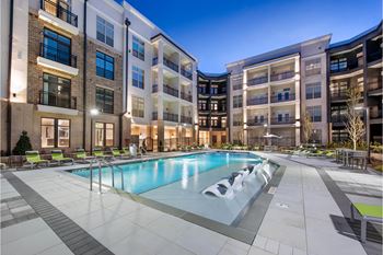 Resort style pool with luxury sundeck