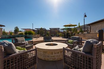 Resort style pool with hot tub, sun deck & fire lounge