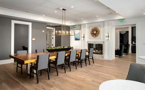 Nashville apartment for rent - Warm Meeting Space with Fireplace and Long Communal Table