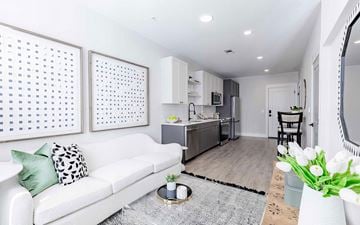 Cary apartment for rent - a living room with a couch and a kitchen
