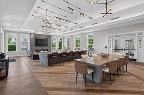 Marshfield townhouse for rent - Clubhouse with a catering kitchen, bar seating, dining space, and lounge at Madison at Marshfield.