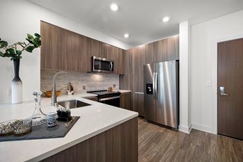 Gourmet kitchens with premium appliances, islands, and pantries
