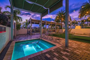 Poolside cabanas and hot tub