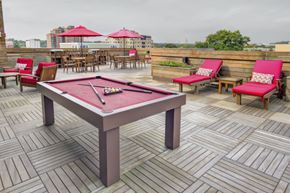Stamford apartment for rent - Rooftop deck with billiard table and lounge seating at 750 Summer Street Apartments, Stamford, CT 06901