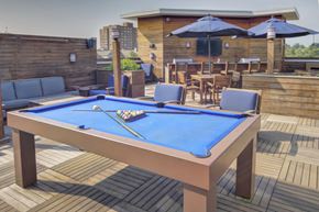 Stamford apartment for rent - Rooftop terrace with pool table and outdoor dining at 163 Franklin Street Apartments, Stamford