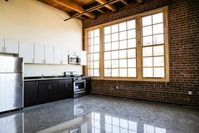 Oakland apartment for rent - Unstaged kitchen/Dining/Living