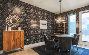 Oakland apartment for rent - A dining room with a round table and chairs.