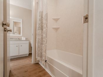 Bathroom with large vanity mirror
