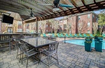 Outdoor patio with tables and chairs