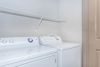 White machines in laundry room