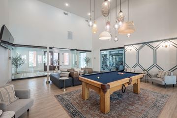 Houston apartment for rent - a living room with a pool table in the middle