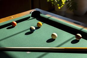 Morganville apartment for rent - a pool table with billiard balls on it