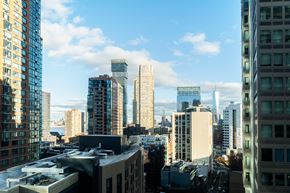 Jersey City apartment for rent - a city skyline with tall buildings and skyscrapers