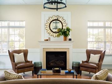 Toms River apartment for rent - a living room with a fireplace and chairs