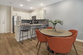 Rockaway Township apartment for rent - a kitchen with an island and a table with chairs
