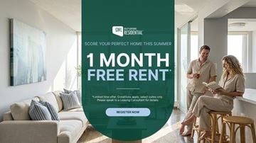 Toronto apartment for rent - A man and woman are sitting in a living room, with a sign offering a free one-month rent.