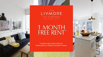Toronto apartment for rent - A living room with a couch and a kitchen area is on offer for rent.