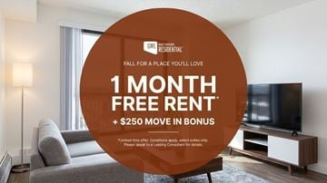 Calgary apartment for rent - A living room with a TV and a couch is advertised to have a free rent for one month and a $250 move in bonus.