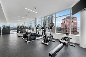 Vancouver apartment for rent - A gym with a view of the city.