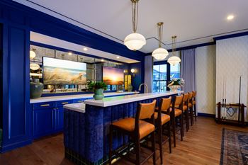 Spacious social lounge with wet-bar