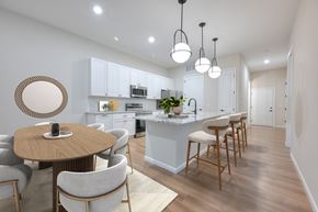 Westerville apartment for rent - A Modern Kitchen with a Dining Area at Fairmont Apartments, Westerville