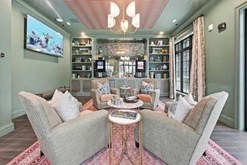 Westerville apartment for rent - A living room with a grey sofa and a coffee table.
