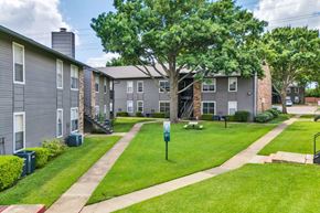 Mckinney apartment for rent - our apartments have a spacious courtyard with grass and trees