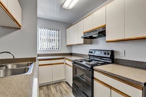 Titusville apartment for rent - The kitchen at Windover Oaks Apartments, Florida 32780