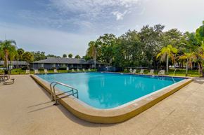 Melbourne apartment for rent - a swimming pool at a resort with a building in the background