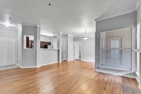 San Antonio apartment for rent - Room with brown floor and grey walls at Villas at Sonterra, San Antonio Texas