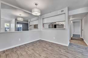 Houston apartment for rent - A spacious room with a wooden floor and white walls at Arrowood Apartments, Houston, 77072