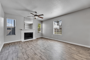Houston apartment for rent - A spacious room with a fireplace at Arrowood Apartments, Houston, Texas