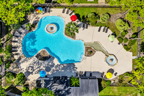 Houston apartment for rent - An aerial view of a swimming pool at Arrowood Apartments, Texas