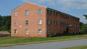 Lynchburg apartment for rent - a brick building on the side of a street