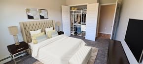 Baxter apartment for rent - A bedroom with a large bed and a walk-in closet.